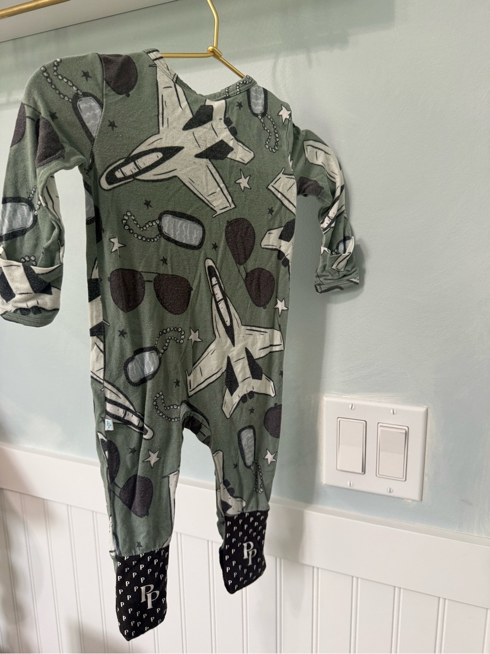 Posh Peanut Green Airplane & Helmet Print Footed One-Piece